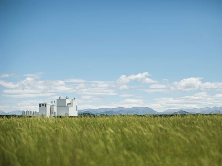 Views of stainless steel milk tanks and drying tower detail. Whareroa NZMP plant.